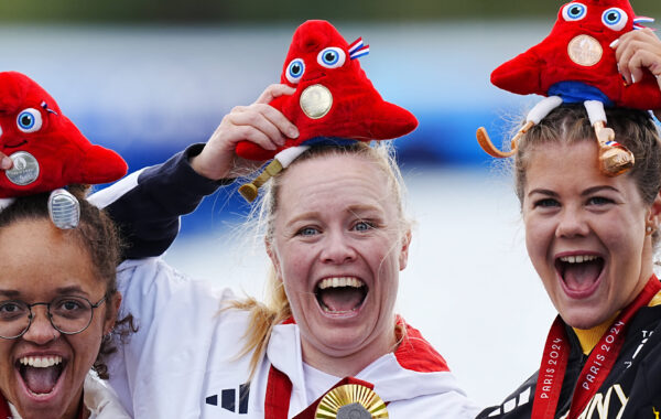 Great Britain's Laura Sugar (centre) celebrates with the gold medal on the podium after winning the Women's Kayak Single 200m - KL3 Final, alongside France's Nelia Barbosa (left) who won silver and Germany's Felicia Laberer who won bronze at the Vaires-sur-Marne Stadium on day eleven of the Paris 2024 Summer Paralympic Games. Picture date: Sunday September 8, 2024. - Photo by Icon Sport